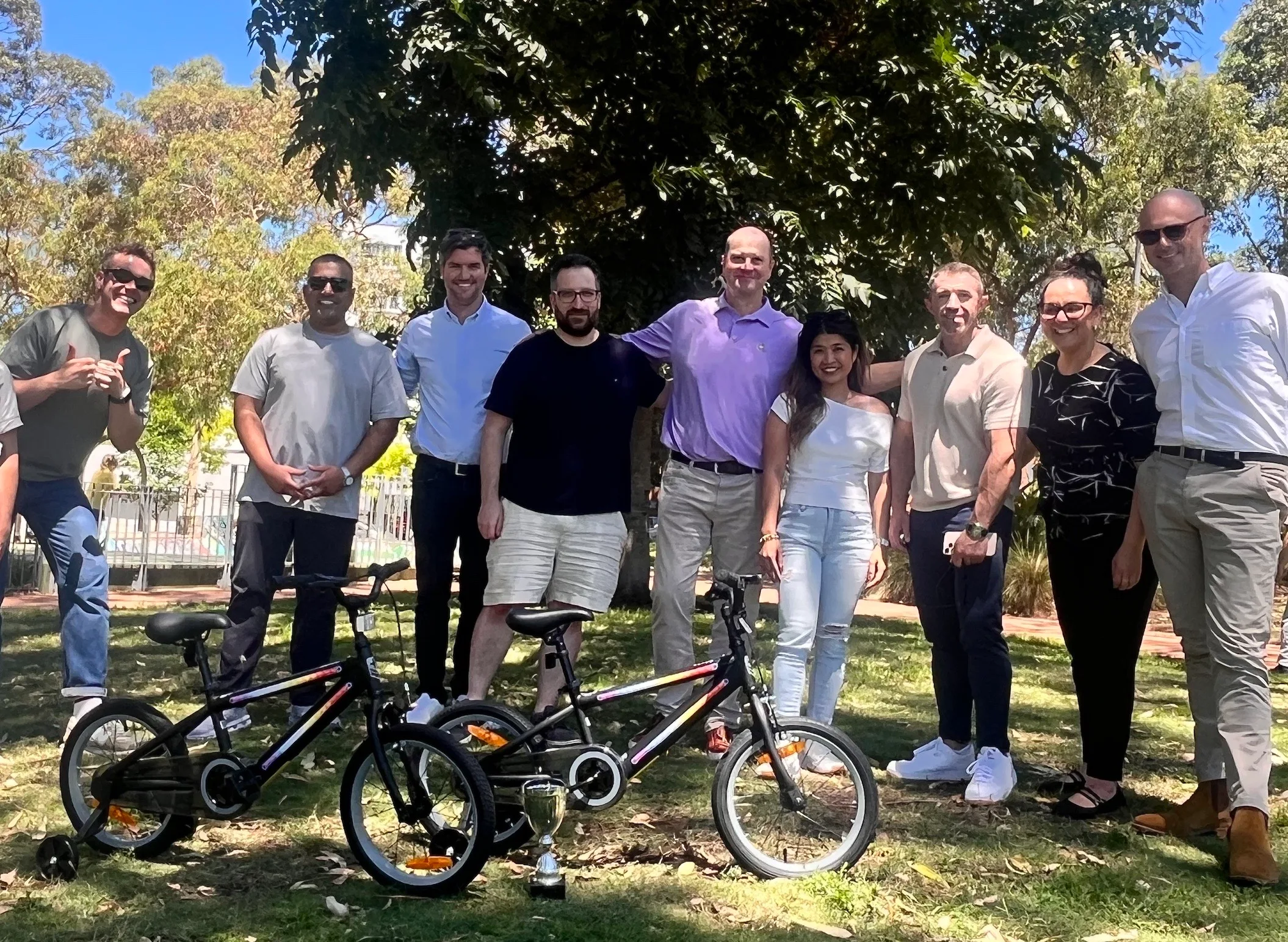 The team after a charity bike build in the park